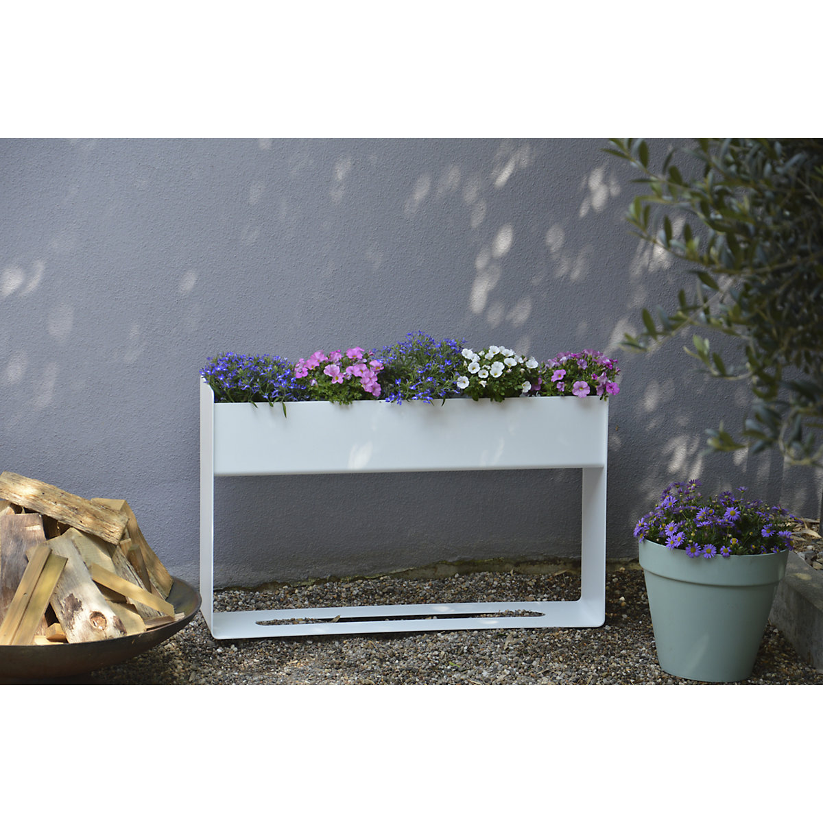 Planter box with drain hole