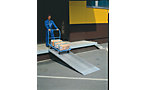 Carril de carga, superficie de rodadura perforada