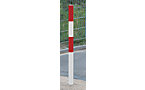 Barrier post for setting in concrete