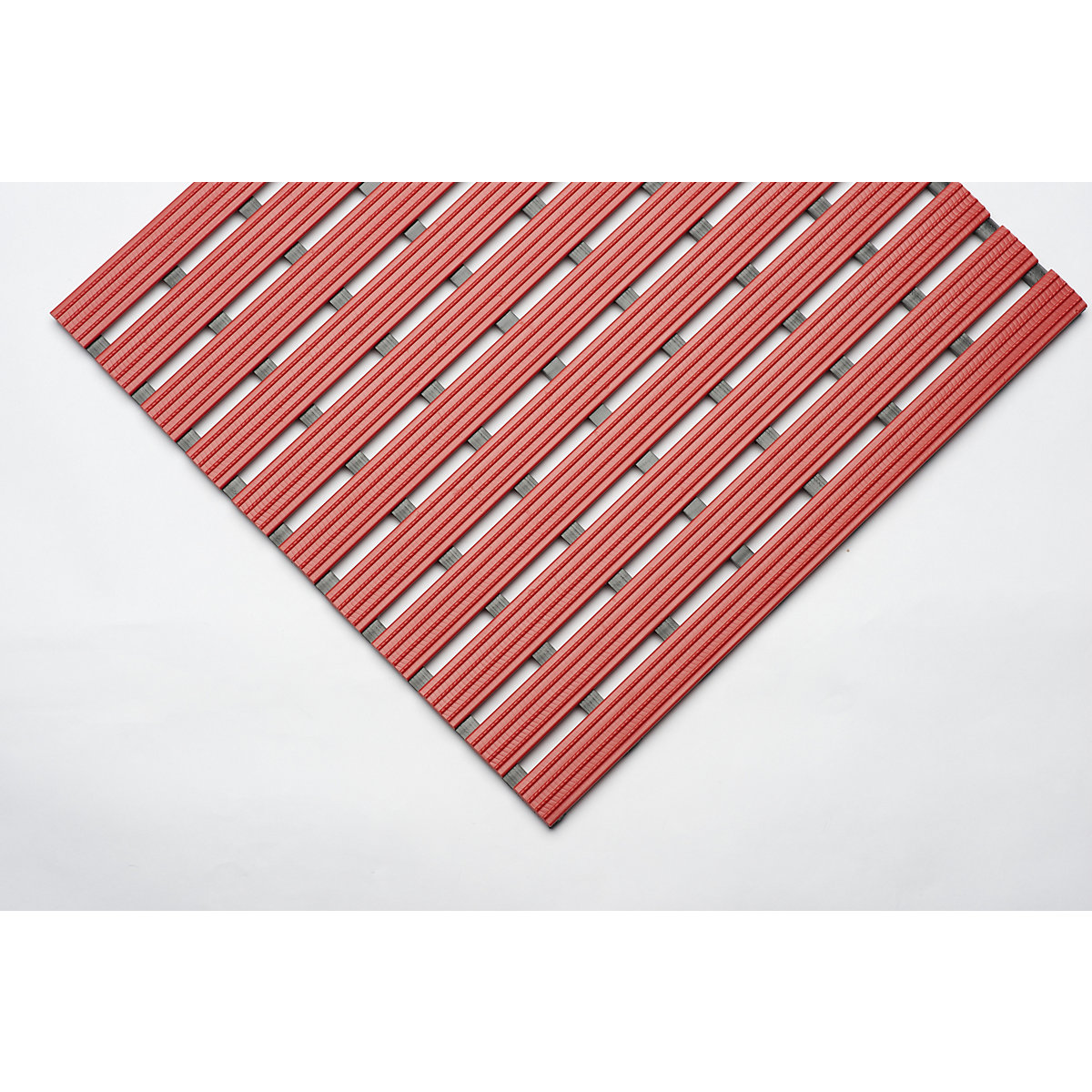Caillebotis en PVC profilé, au m lin., surface antidérapante en profilés de PVC dur, largeur 600 mm, rouge