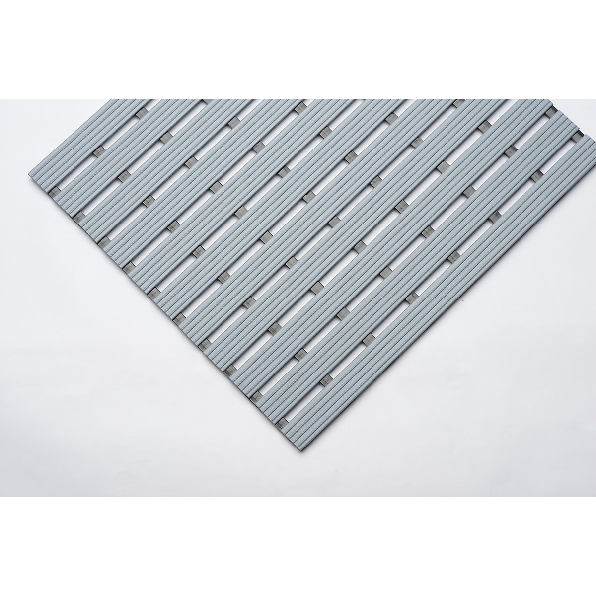 Caillebotis en PVC profilé, au m lin., surface antidérapante en profilés de PVC dur, largeur 600 mm, gris