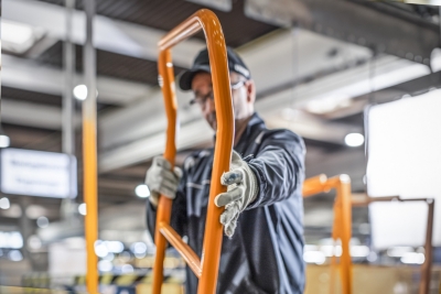 Employee checks a product from in-house production