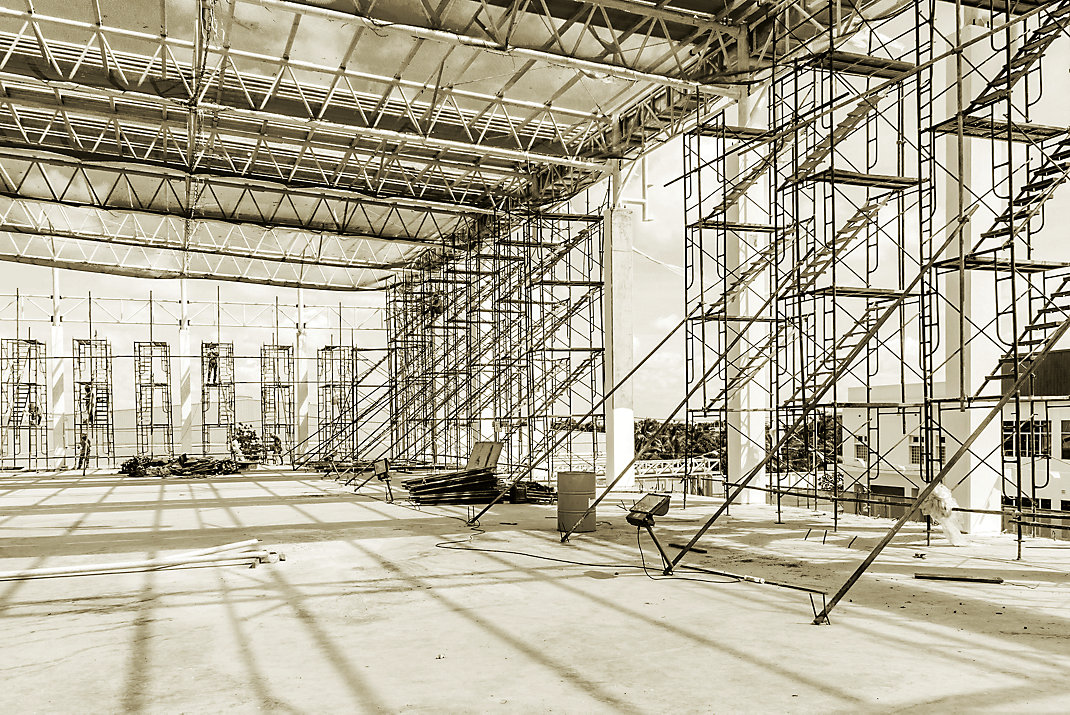 A hall with ladders and scaffolding