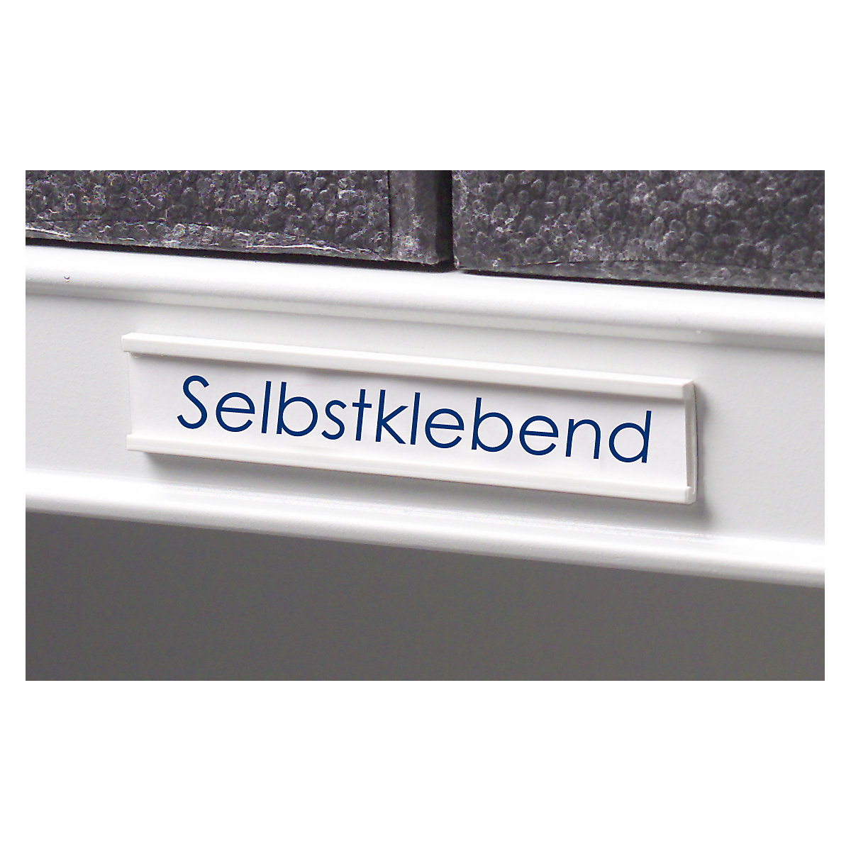 Label holders, self-adhesive