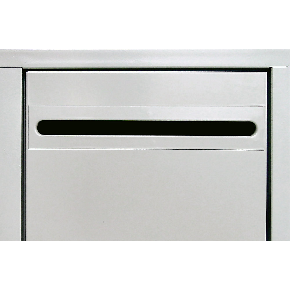 Fente pour pièces de monnaie