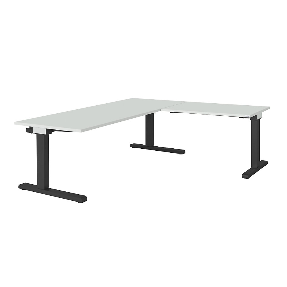 Bureau réglable en hauteur, relié