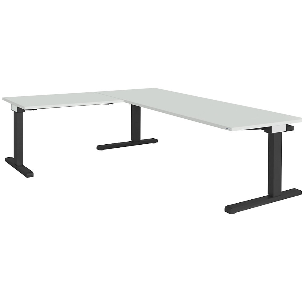 Bureau réglable en hauteur, relié