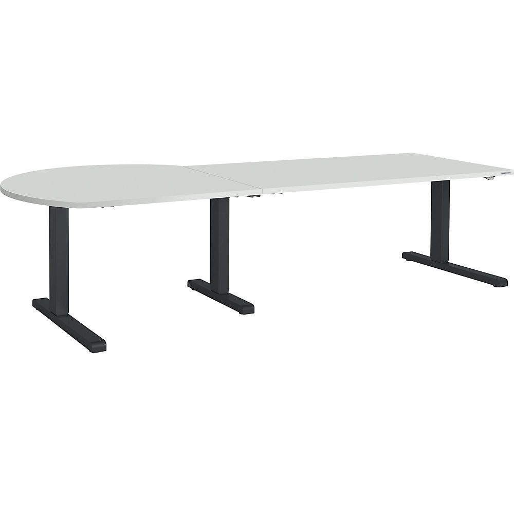 Bureau réglable en hauteur, relié