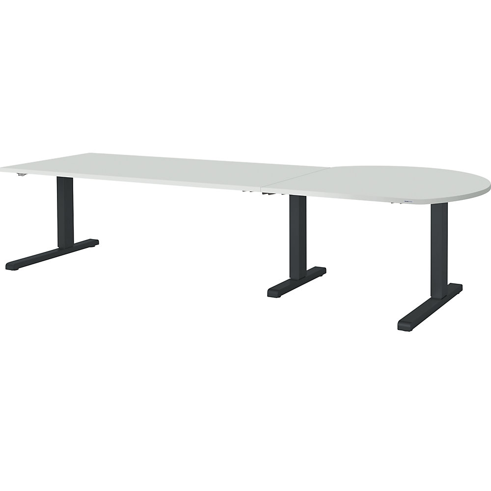 Bureau réglable en hauteur, relié