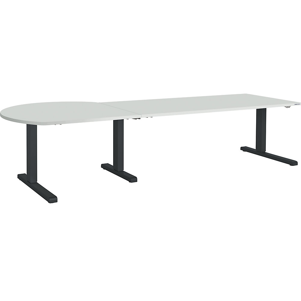 Bureau réglable en hauteur, relié