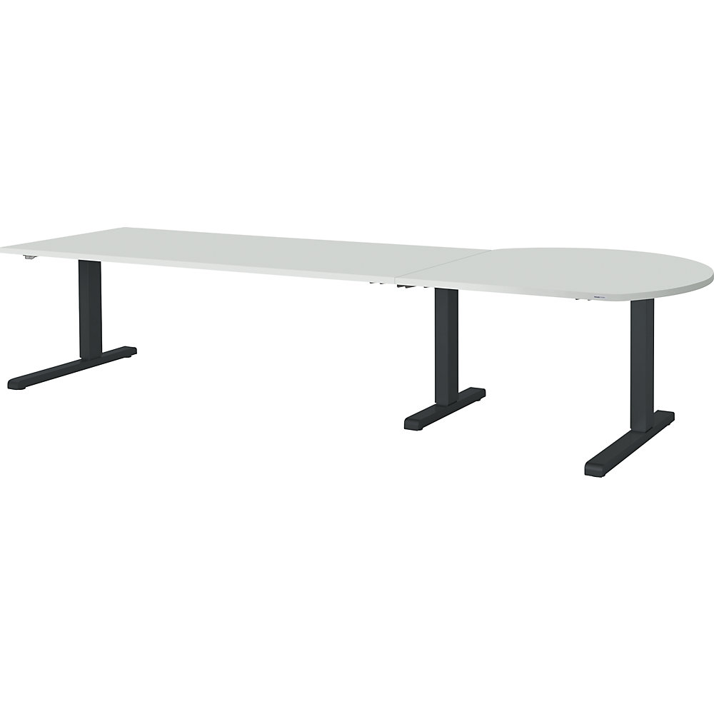 Bureau réglable en hauteur, relié