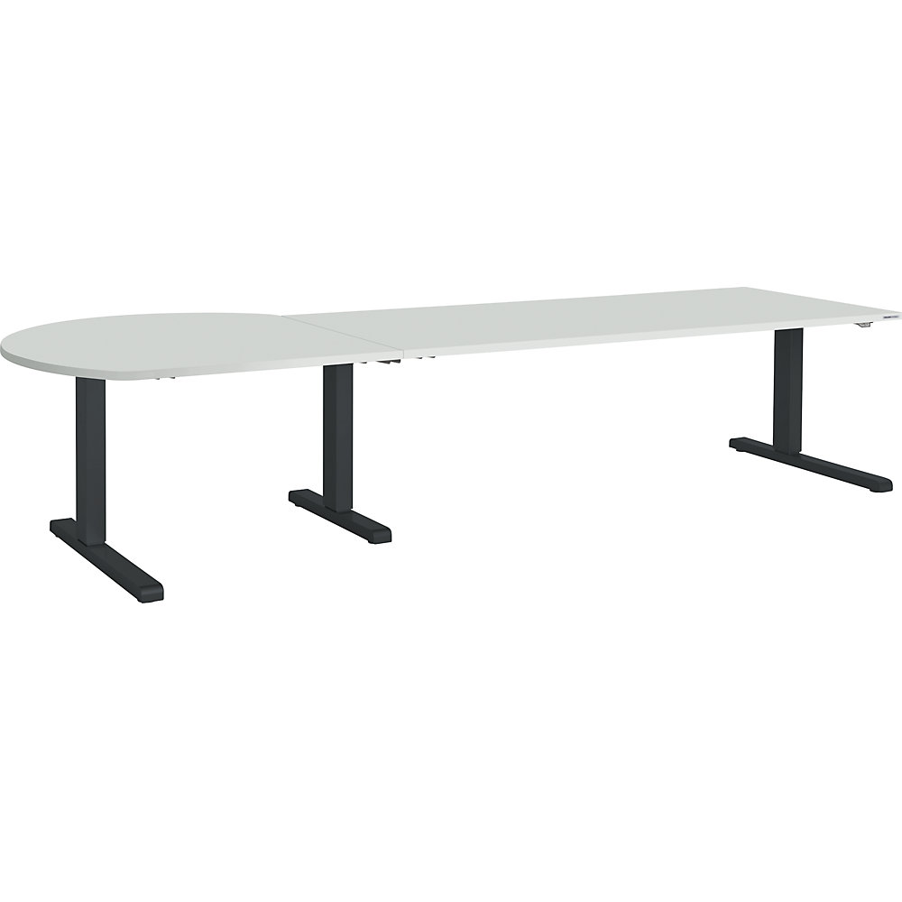 Bureau réglable en hauteur, relié