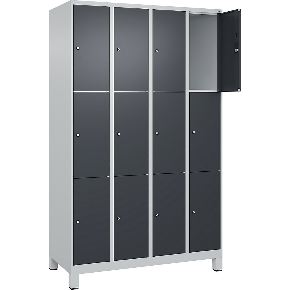 C+P Armario de compartimentos bajo llave Classic PLUS, 4 compartimentos, gris luminoso / gris, anchura 1200 mm, 12 balda, con patas