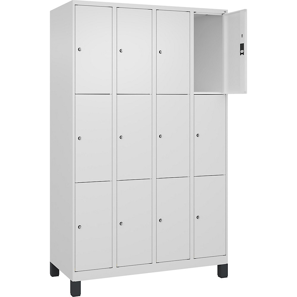 C+P Armario de compartimentos bajo llave Classic PLUS, 4 compartimentos, blanco tráfico, anchura 1200 mm, 12 baldas, con patas