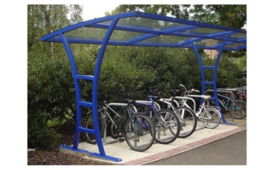 Outside, sheltered bike storage rack with bicycles