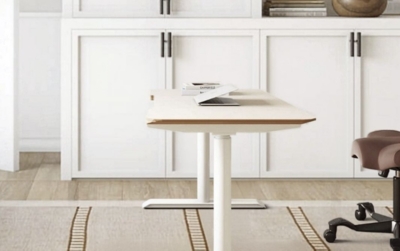 height adjustable computer desk in a living room