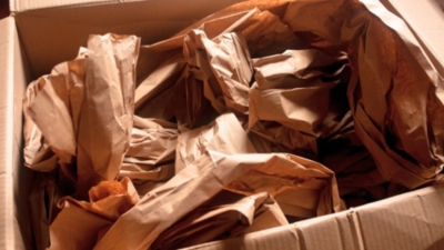 Kraft packing paper used to wrap up a parcel for delivery