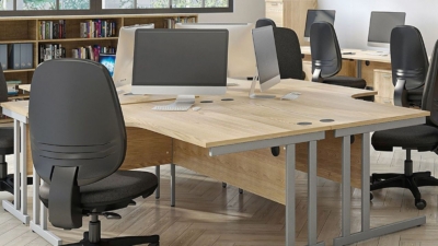 Cluster of ergonomic desks in a modern office