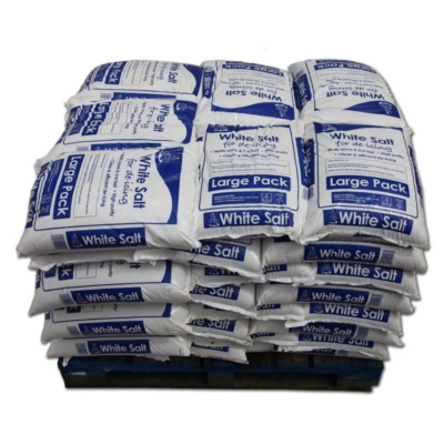 Bags of rock salt for winter gritting, stored on a pallet